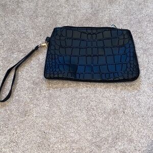 Small black wristlet
Never used